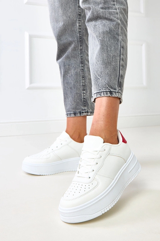 Sneakers bianche con platform e... Sneakers bianche con platform e...