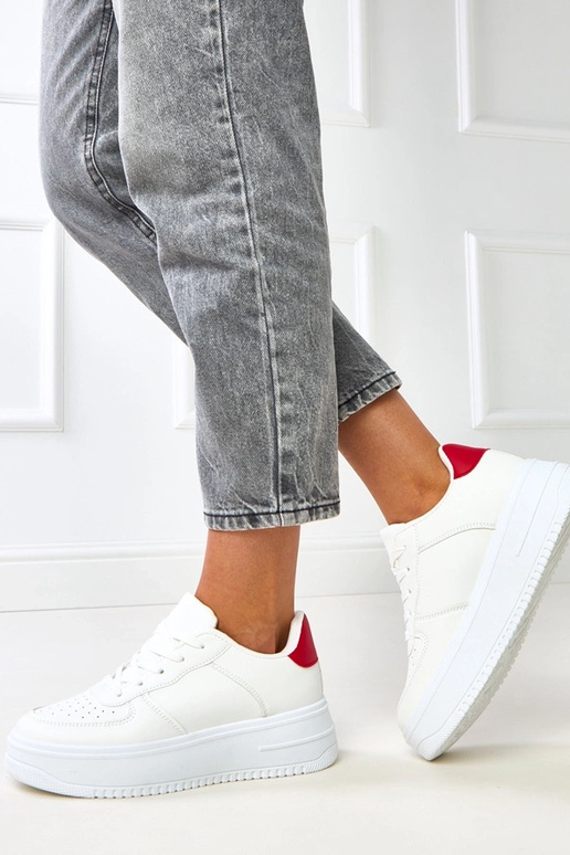 Sneakers bianche con platform e... Sneakers bianche con platform e...