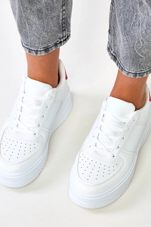 Sneakers bianche con platform e... Sneakers bianche con platform e...