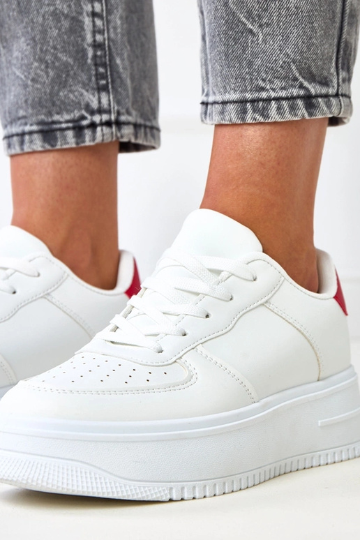 Sneakers bianche con platform e... Sneakers bianche con platform e...