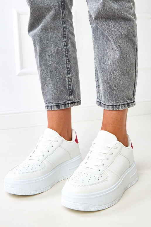 Sneakers bianche con platform e... Sneakers bianche con platform e...