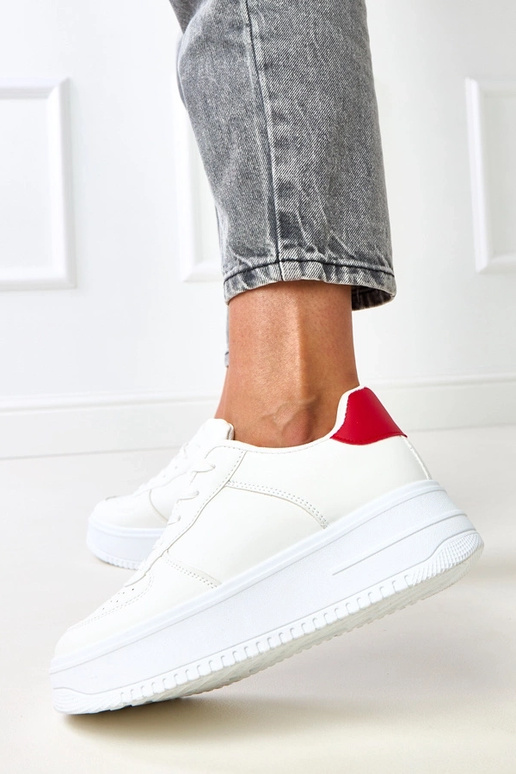 Sneakers bianche con platform e... Sneakers bianche con platform e...