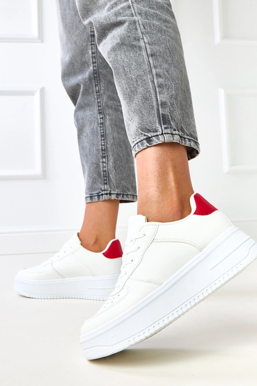 Sneakers bianche con platform e... Sneakers bianche con platform e...