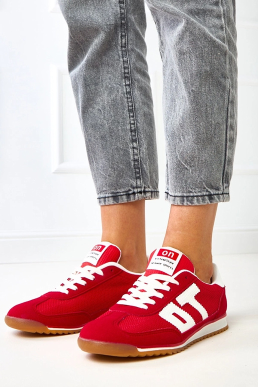 Scarpe sportive rosse con elementi...