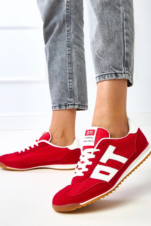 Scarpe sportive rosse con elementi...