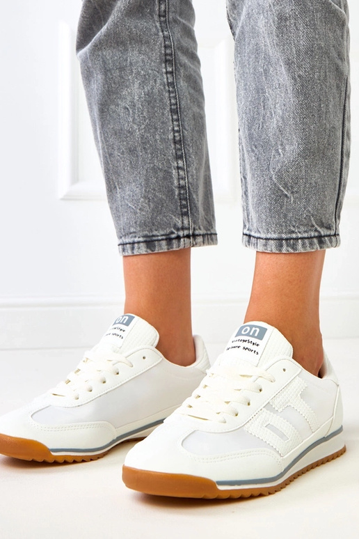 Scarpe sportive bianche con elementi...