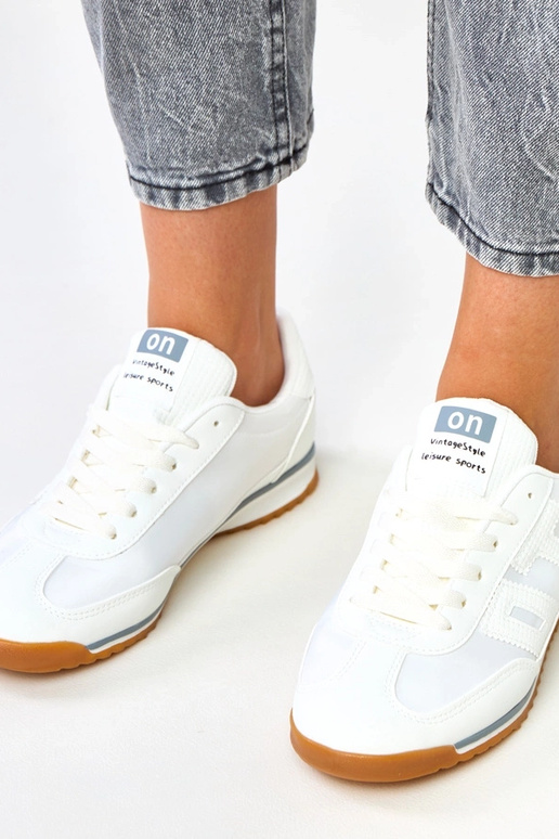 Scarpe sportive bianche con elementi...