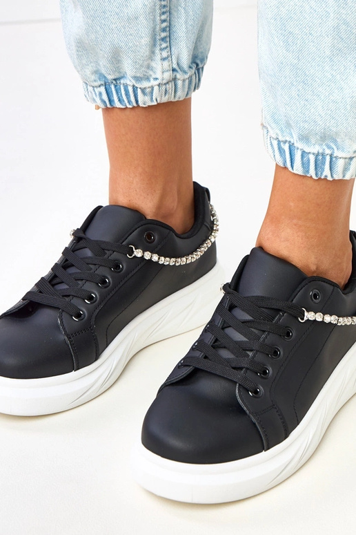 Sneakers nere con plateau e catena...