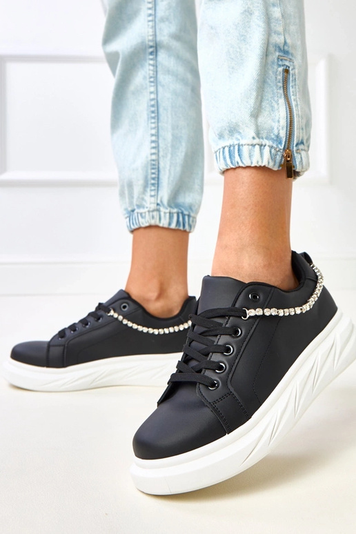 Sneakers nere con plateau e catena...