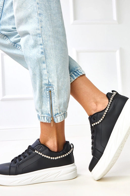 Sneakers nere con plateau e catena...