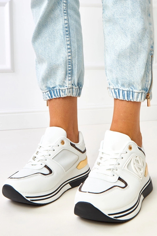 Sneakers bianche e nere con plateau...