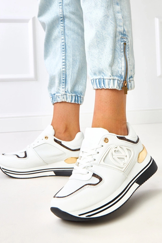 Sneakers bianche e nere con plateau...