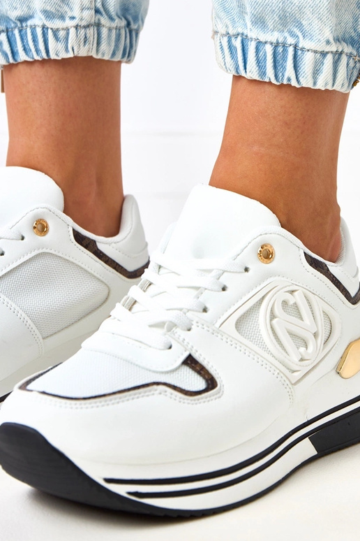 Sneakers bianche e nere con plateau...