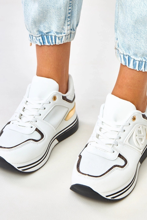 Sneakers bianche e nere con plateau...