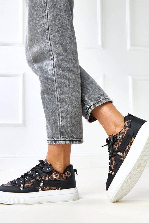 Sneakers bianco-neri con motivo...