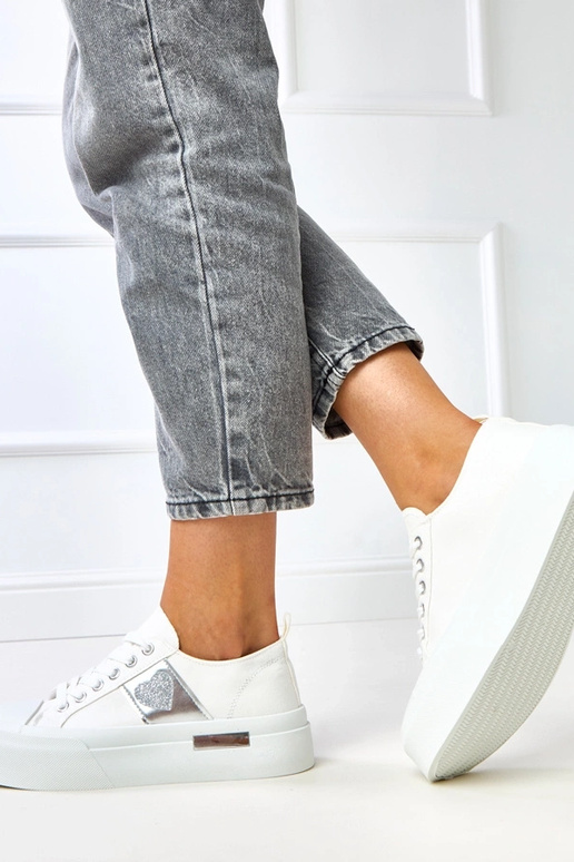 Scarpe sportive bianche con cuore Nihal