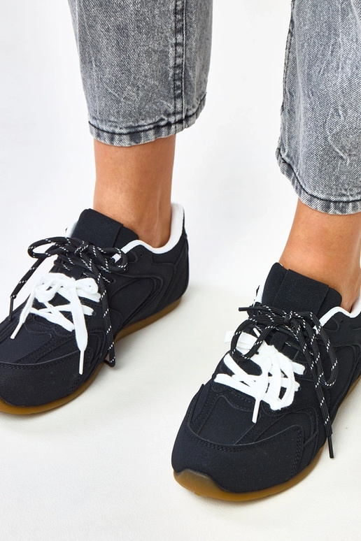 Scarpe sportive nere con doppio lacci...