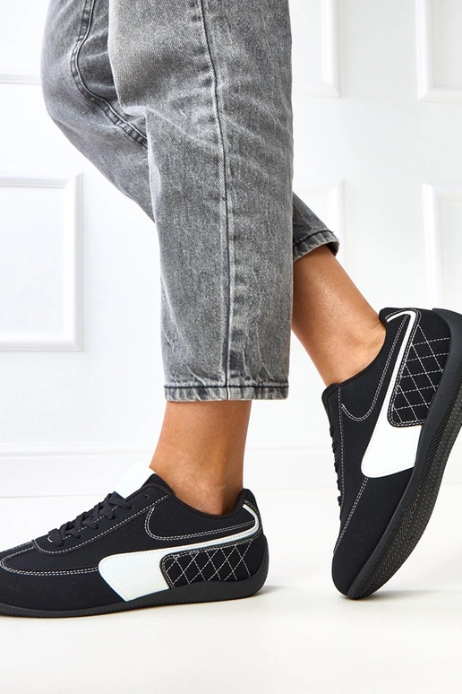 Scarpe sportive gialle con accento...