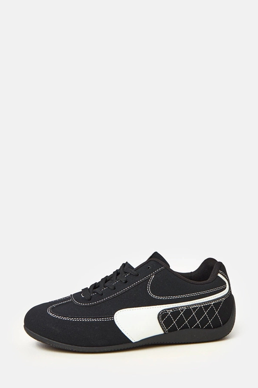 Scarpe sportive gialle con accento...