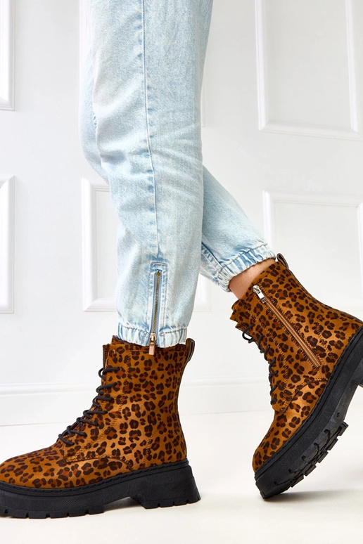 Stivaletti marroni con motivo...