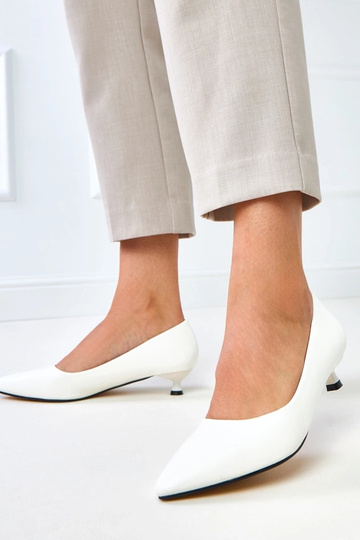 Décolleté bianchi con tacco...