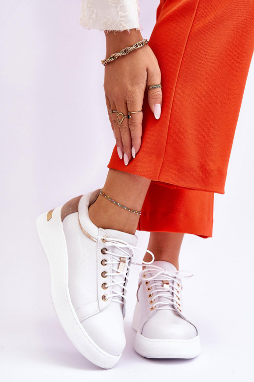 Femminile Pelle scarpe da ginnastica con una piattaforma Colore bianco Caressa Femminile Pelle scarpe da ginnastica con una piattaforma Colore bianco Caressa