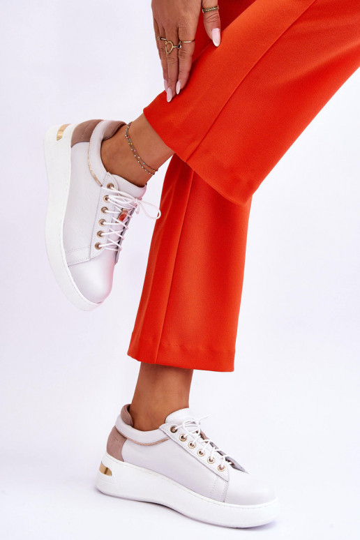 Femminile Pelle scarpe da ginnastica con una piattaforma Colore bianco Caressa Femminile Pelle scarpe da ginnastica con una piattaforma Colore bianco Caressa