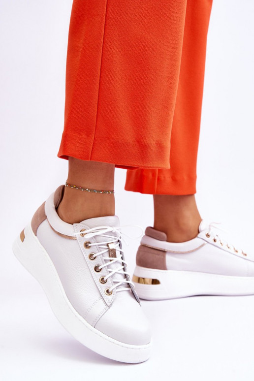 Femminile Pelle scarpe da ginnastica con una piattaforma Colore bianco Caressa Femminile Pelle scarpe da ginnastica con una piattaforma Colore bianco Caressa