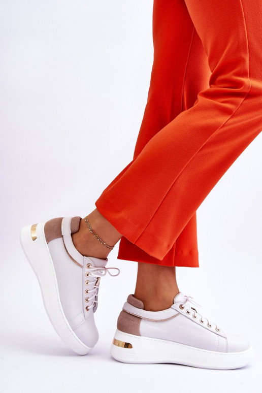 Femminile Pelle scarpe da ginnastica con una piattaforma Colore bianco Caressa Femminile Pelle scarpe da ginnastica con una piattaforma Colore bianco Caressa