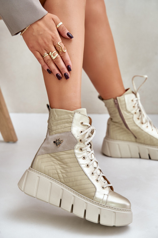 Pelle Stivali con una piattaforma Deveciejka 06751-25 colore dorato