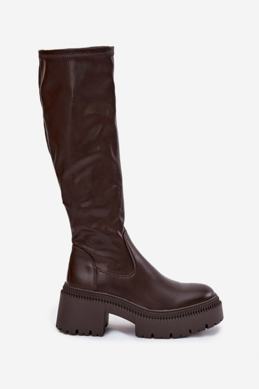 Stivali alti da donna con tacco massiccio e plateau modello slip-on di colore marrone Florinne Stivali alti da donna con tacco massiccio e plateau modello slip-on di colore marrone Florinne