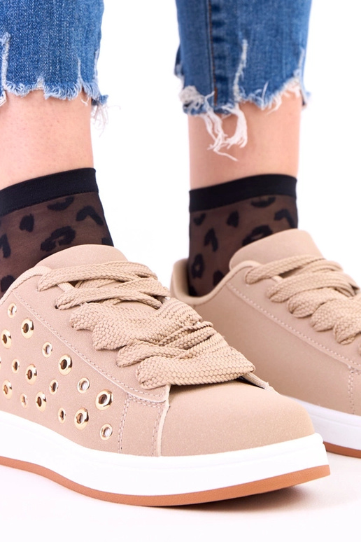 Sneakers marroni su piattaforma con...