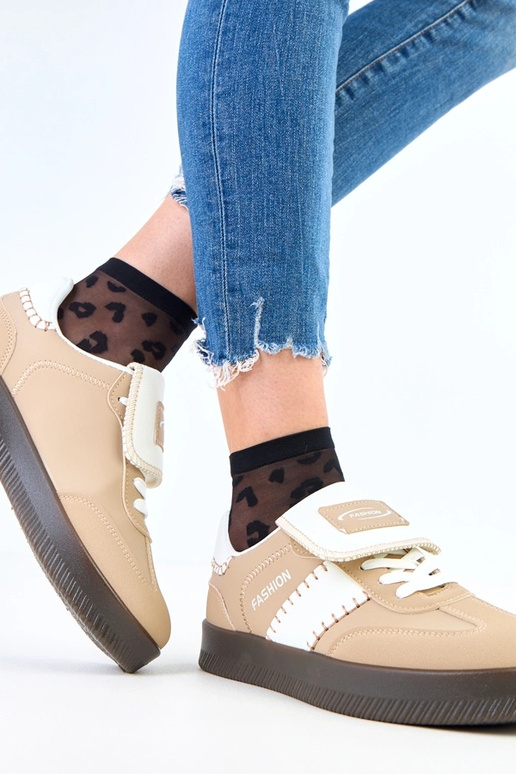 Sneakers marroni su piattaforma con...