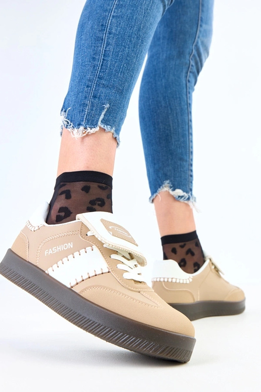 Sneakers marroni su piattaforma con...