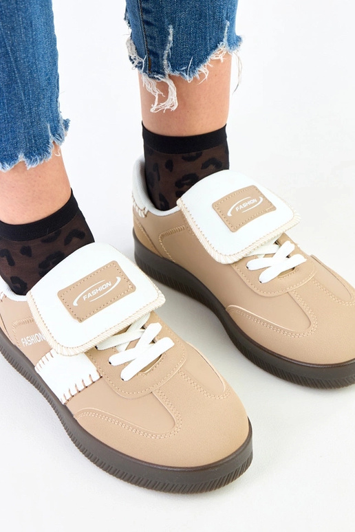 Sneakers marroni su piattaforma con...