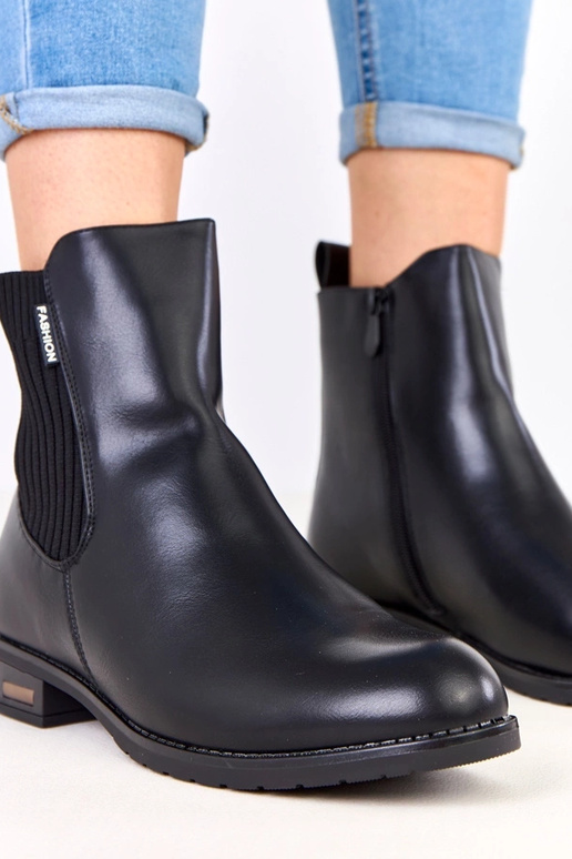 Stivaletti neri con suola piatta e...