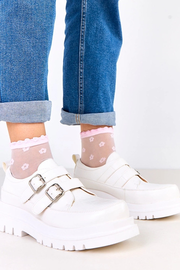 Stivaletti bianchi su suola...