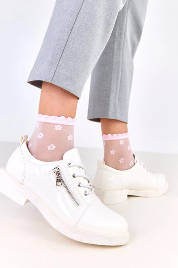 Stivaletti laccati bianchi...