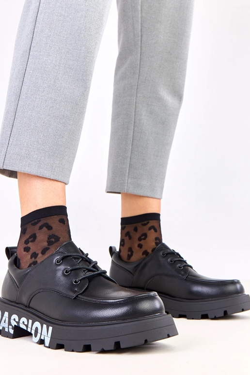 Pantofole nere femminili con motivo...