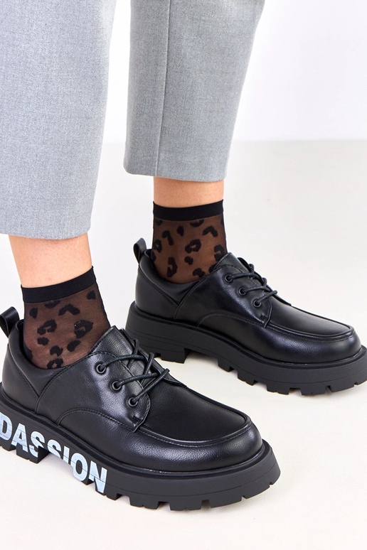 Pantofole nere femminili con motivo...