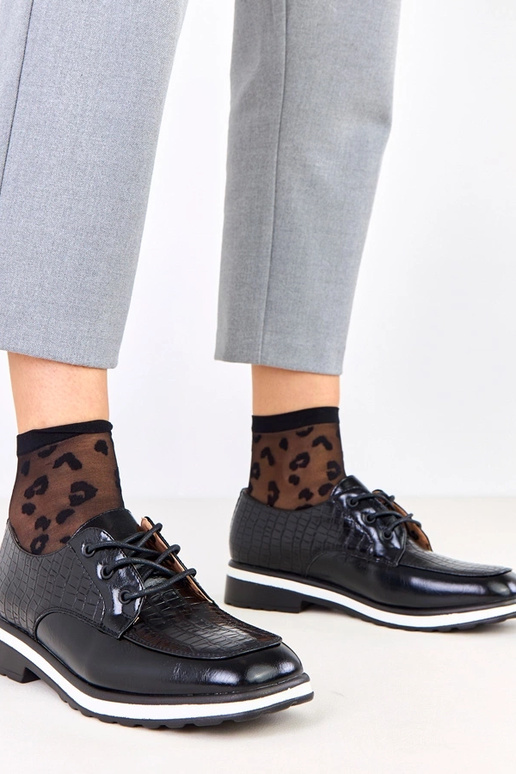 Pantofole nere con stampa e punta...