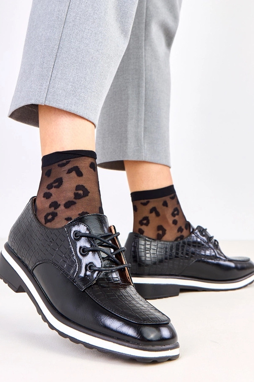 Pantofole nere con stampa e punta...