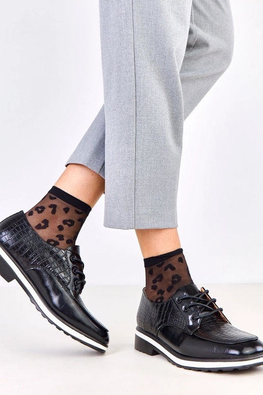 Pantofole nere con stampa e punta...