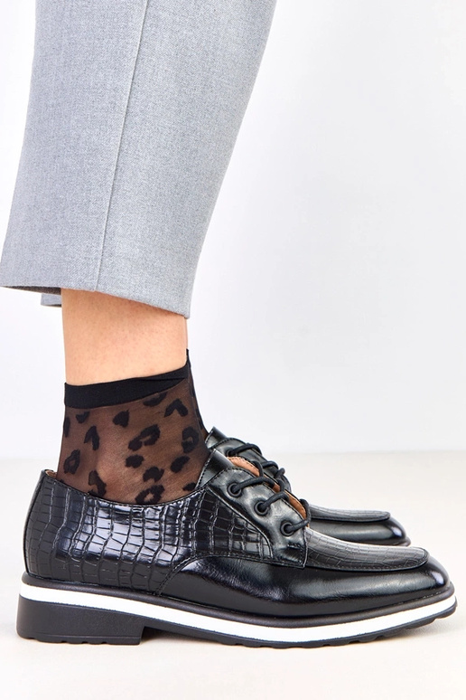 Pantofole nere con stampa e punta...