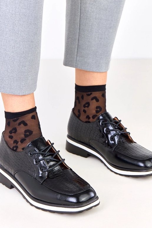 Pantofole nere con stampa e punta...