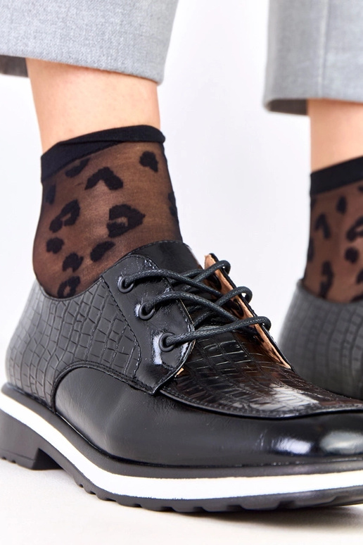 Pantofole nere con stampa e punta...