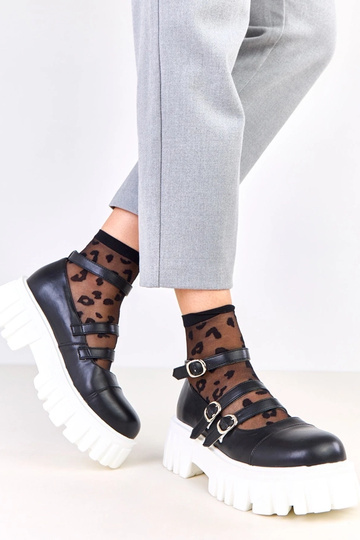 Pantofole nere su suola...