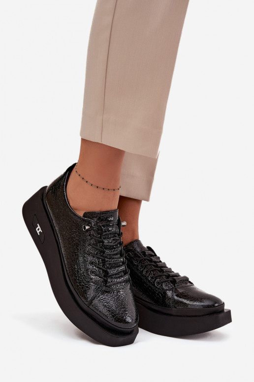 Stivaletti in vera pelle laccata Femminile con una piattaforma Artiker 57C2041 colore nero