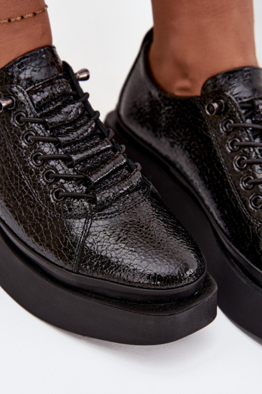 Stivaletti in vera pelle laccata Femminile con una piattaforma Artiker 57C2041 colore nero