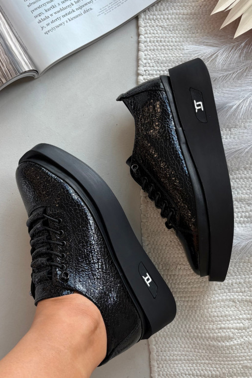 Stivaletti in vera pelle laccata Femminile con una piattaforma Artiker 57C2041 colore nero